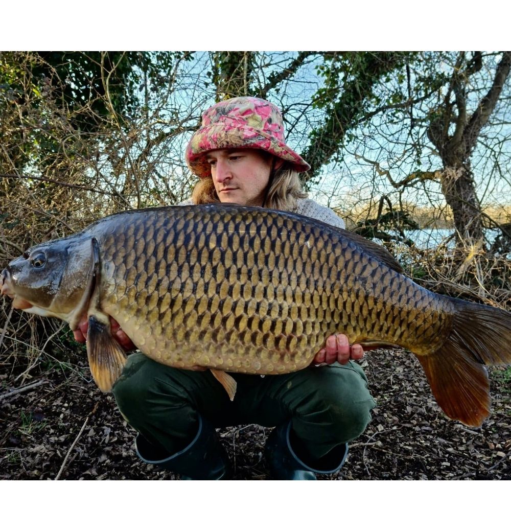 Dion with a Common Carp