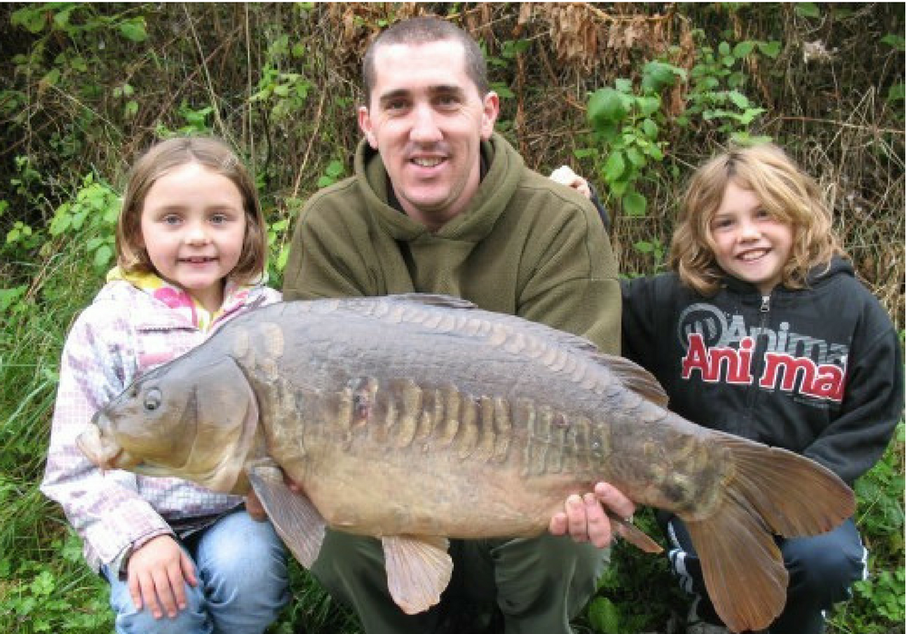 Dan with a Canal Linear Carp