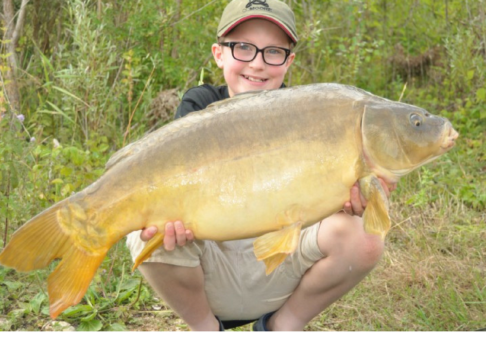 James Bushnell with a French Mirror Carp