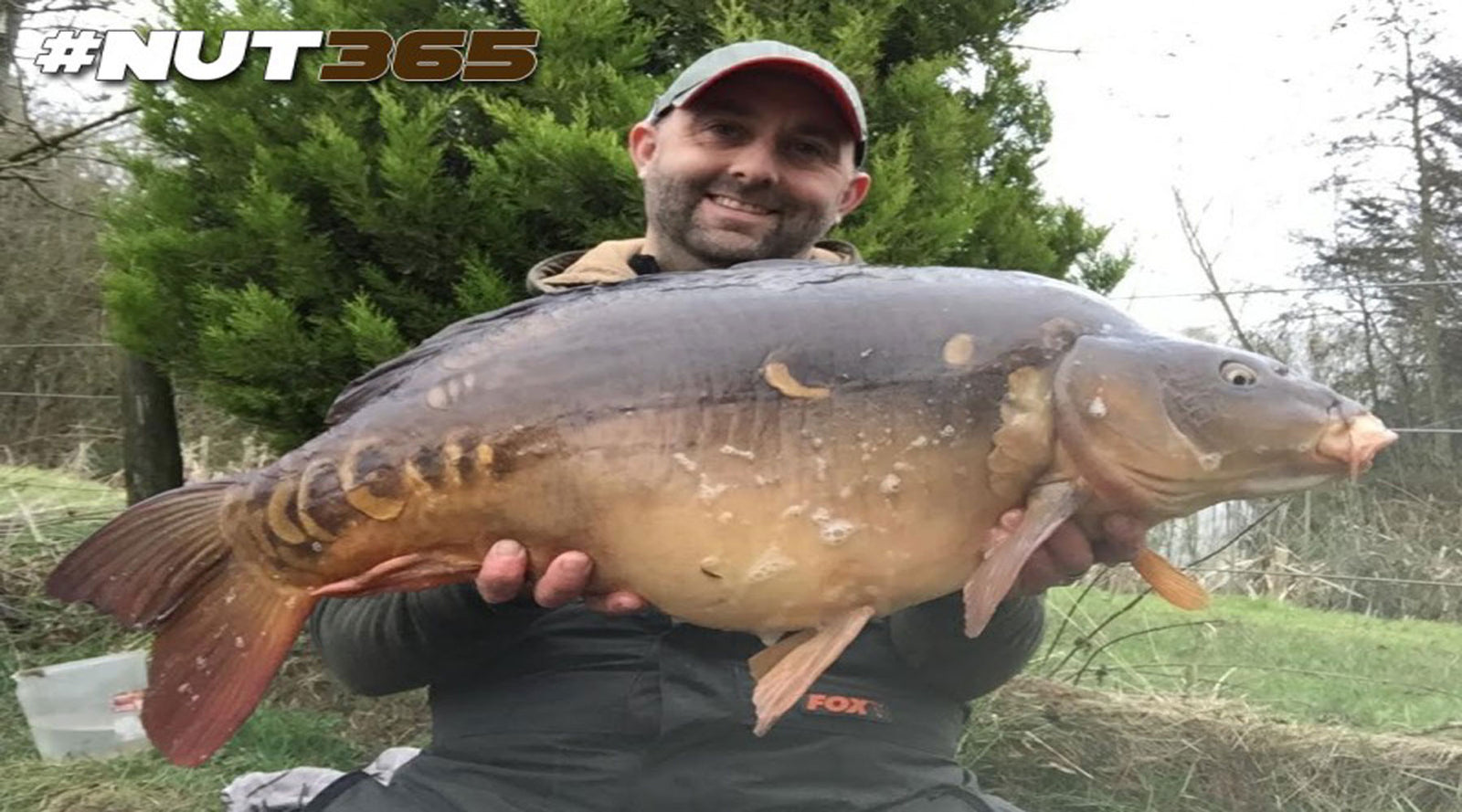 Mark Wells with a Mirror Carp