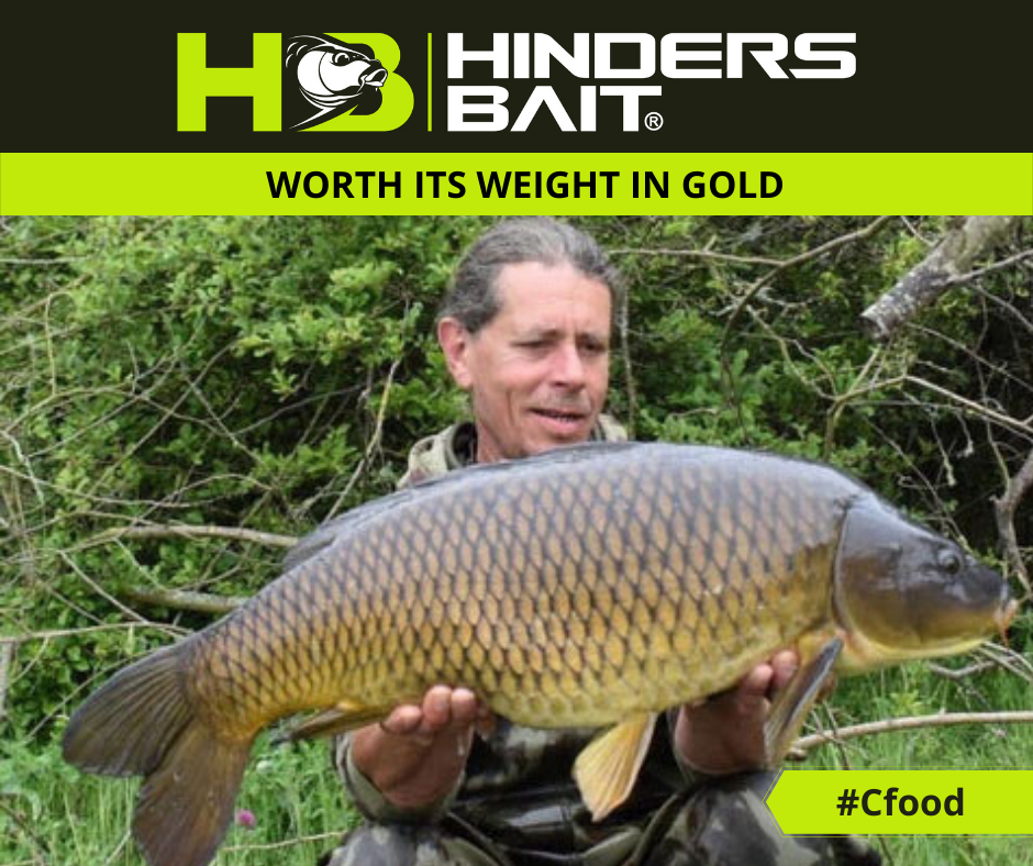 Andy with a stunning Common Carp caught from the private lake